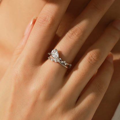 Sterling Silver Entangled Lines Water Drop CZ Ring